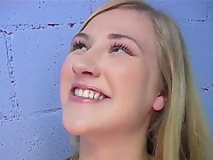 Pretty blonde shows her butt and sucks a gloryhole BBC