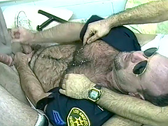 Horny Gay Bear Cop Sucking Some Big Criminal Cocks