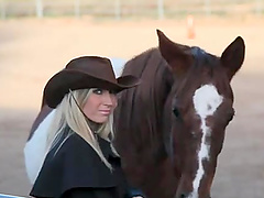 A lonely cowgirl meets a cowboy and fucks in the barn