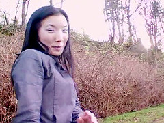 Japanese amateur on an empty beach playfully strips and romps