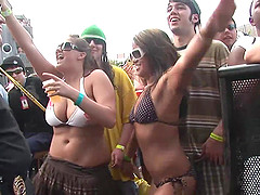 Outdoor party featuring model in bikini shaking their nice ass