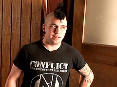 Tattooed guy masturbates his big penis with a great passion