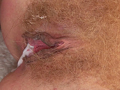 Buxom blonde with a hairy pussy enjoying a hardcore doggy style fuck