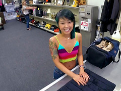 Tattooed Asian hottie goes in a pawn shop for a fuck