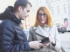 An amateur redhead in glasses bounces his dick as he sits in a chair