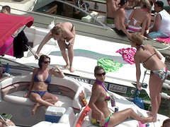 Bikini-clad brunette with a great body flashing her tits and pussy in public