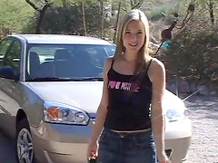 Shaved blonde teenie with small boobs stimulating her cunt outdoors