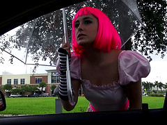 Cosplaying girl with pink hair gets fucked in a car