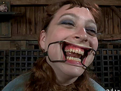 Raunchy honey with big naturals gets tied up in the dungeon