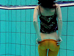 Sexy Nina Markova reveals her private areas in the pool