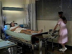 Brunette nurse Brittany Andrews giving dick blowjob