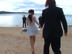 Asian hottie Mizuki Miri places her hairy twat on a cock at the beach