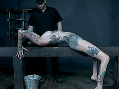 Fetish bondage scene with caged inked teen Rocky Emerson