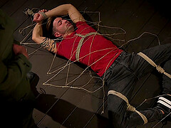 Kinky gay couple in a blindfolded blowjob session in the dungeon