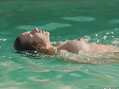 Elena Black rides a hard cock out by the pool
