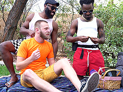 Bearded dude sucks one large black dick while riding another