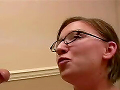 Mistress with glasses swallows