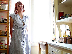 Modest redhead girl plays with her pussy