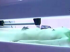 Teen with small tits masturbates in solorium