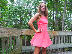 Solo outdoors video of mature star Jaimie playing with her puss
